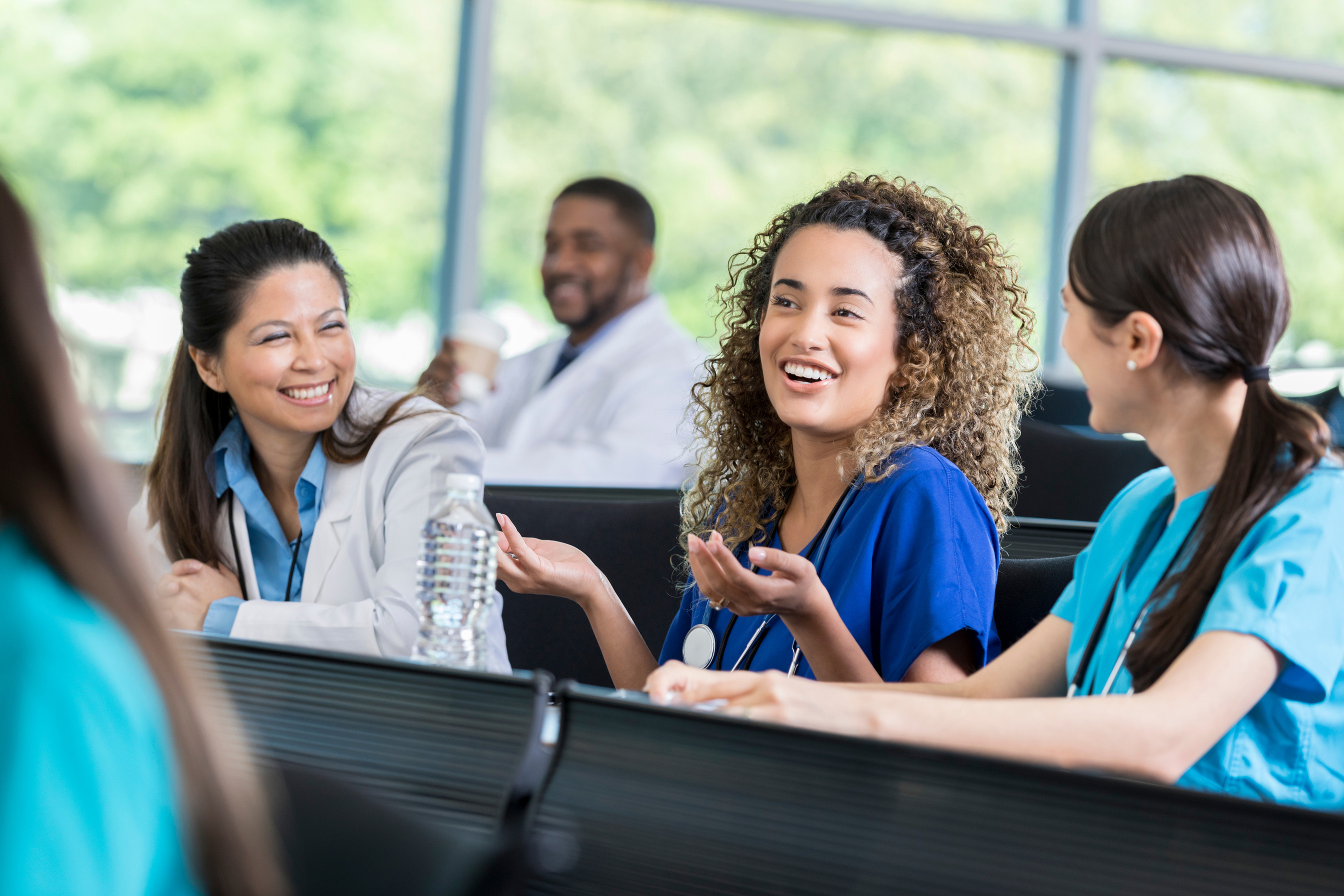 Young nurse enjoys healthcare training seminar